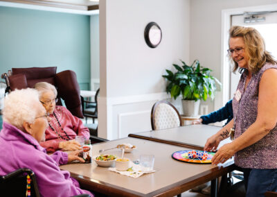 nurse playing games with senior residents