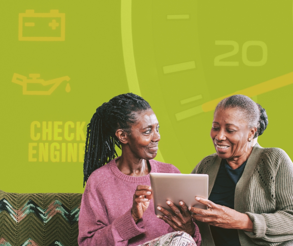Daughter and senior mother discussing senior living in front of a check engine light.
